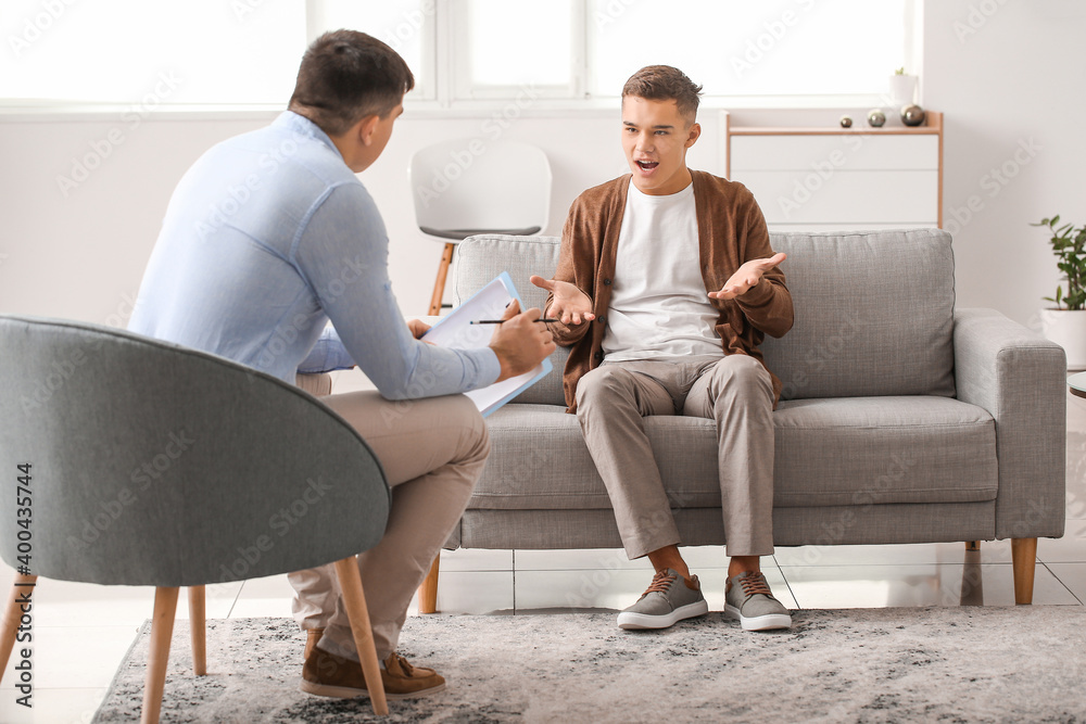Teenage boy at psychologist's office