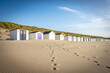row of beach huts at the beach, texel island, netherlands
