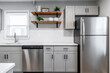 Kitchen with gray cabinets, white subway tile backsplash and wood accents 
