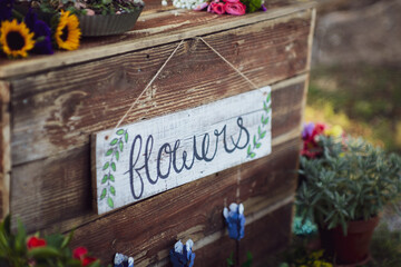 Flower stand sign in the country