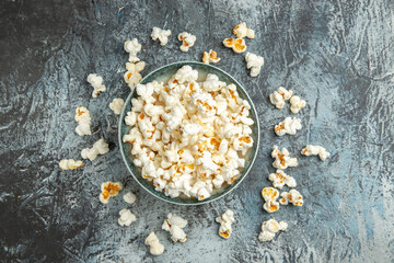 Canvas Print - top view fresh popcorn on light background snack rusk cips