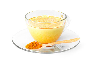 Wall Mural - Golden milk ( turmeric latte ) in glass cup with tumeric powder in wooden spoon isolated on white background.