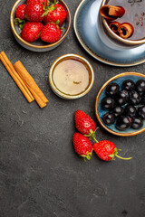 top view fresh red strawberries with tea and olives on dark background fruit berry fresh