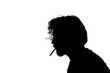 © ErdalIslak - Monochrome silhouette of a smoking man isolated on white background.