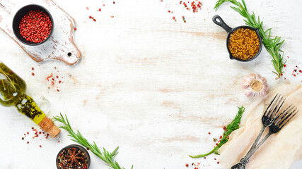 Wall Mural - Kitchen banner with board, spices and herbs. Top view. Free space for text.