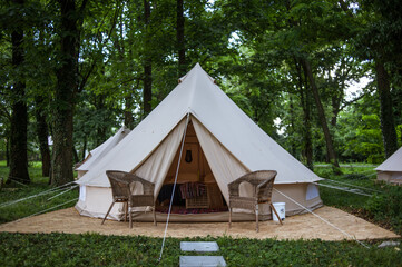 glamping site in the woods on a calm afternoon.
