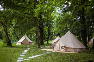 glamping site in the woods on a calm afternoon.