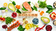 © Yaruniv-Studio - Food background. Healthy food for humans: vegetables, fruits, fish, meat, nuts and greens. on a white wooden background. Top view. Free copy space.
