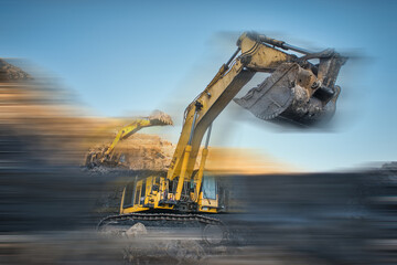 blurred view of big excavator at worksite of coal mine