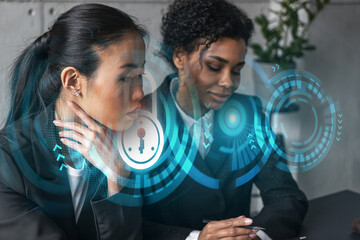 Two businesswomen work together in modern office on new project. Double exposure. Concept of success. Security lock icon.