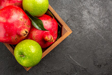Top View Fresh Red Pomegranates With Green Apples On Dark Background Ripe Fruit Color