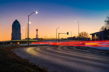 Wall Mural - Des Moines 801 Grand Ave. with light trails at sunset.