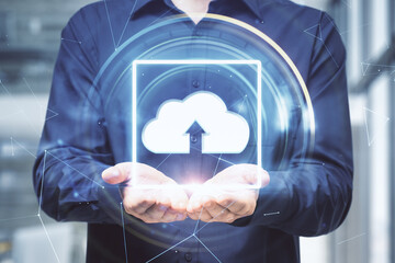 Poster - Businessman holding glowing cloud interface