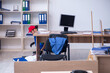 © Elnur - Young male contractor cleaning the office