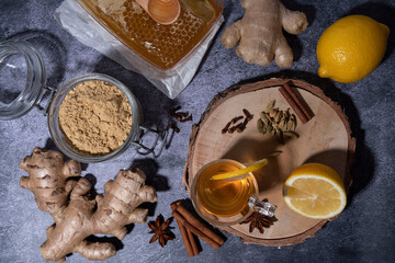 Wall Mural - Ginger root and powder for cooking with spices