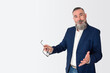 bearded man with open arms and glasses in hand, funny and friendly expression, concept show,