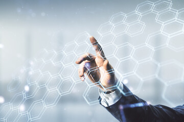 Poster - Man hand clicks on abstract virtual wireless technology hologram with hexagon on blurred office background, artificial intelligence and machine learning concept. Multi exposure