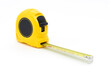 © dnd_project - Yellow measuring tape isolated with a white background.