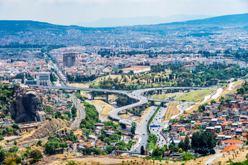 Buca District and Ataturk Mask view from Kadifekale Castle in Izmir City.