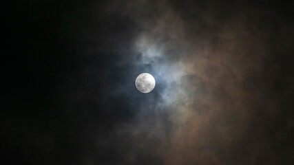 full beaver moon and clouds