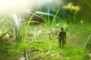 Surreal image of mysterious man walking alone