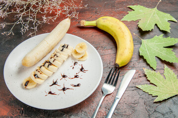 front view delicious banana with sliced pieces inside plate on dark background fruit sweet photo tree color