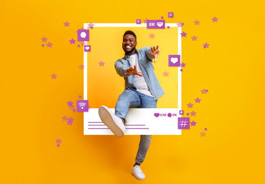 Wall Mural - african american guy dancing and jumping out of photo frame on yellow background, collage with socia