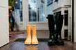© Westend61 - Jump boot on floor at home entrance