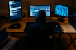 © JOSEP M ROVIROSA/Westend61 - Computer hacker doing coding on computer while sitting at office