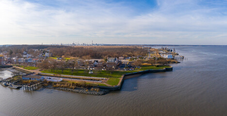 Canvas Print - Aerial view of Delaware City New Castle County, Delaware, United States. Small port town on the eastern terminus of the Chesapeake and Delaware Canal with an oil refinery in the background