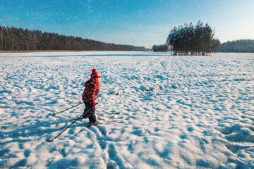 Canvas Print - happy cute girl ski in winter nature, kids seasonal sport