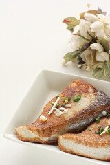 Wall Mural - Asiian food, fried yellowtail fillet on dish with copy space