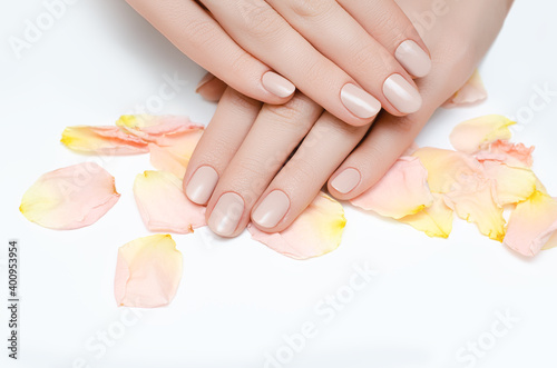 Female hands with coral nail design Fototapete