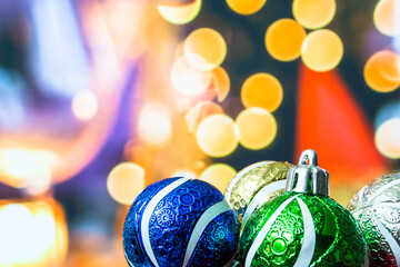 Wall Mural - Colorful Christmas baubles in blur background