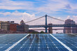 Solar panel over cityscapes, solar power green energy for life concept,New York City USA,
