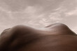 © master1305 - Way up. Detailed texture of human skin. Close up of young african-american male body surface like landscape with the sky on background. Skincare, bodycare, healthcare, inspiration, fantasy artwork.