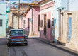 classic car parking on the street in santiago de cuba,cuba