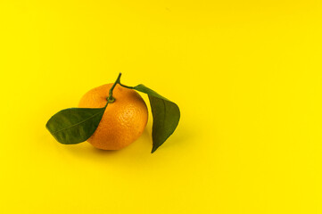 Orange fruit withleaves isolated on white background.