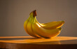 © Marco - Still life of bananas. Bunch of bananas on a wooden table lit by natural sunlight. Minimal creative design. Dark background,