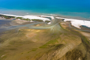 Wall Mural - aerial view to sand spit between lake and sea