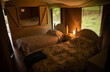 © Sam Edwards/Caia Image - Beds with quilts in yurt cabin