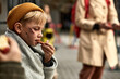 © Roman - sad street boy is eating food on street, want to be loved and have shelter, portrait of unhappy child in dirty clothes