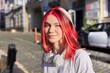 © Valerii Honcharuk - Beautiful smiling happy teenage student with trendy colored hairstyle headphones