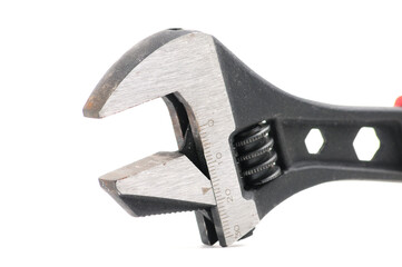 Adjustable wrench on a white background