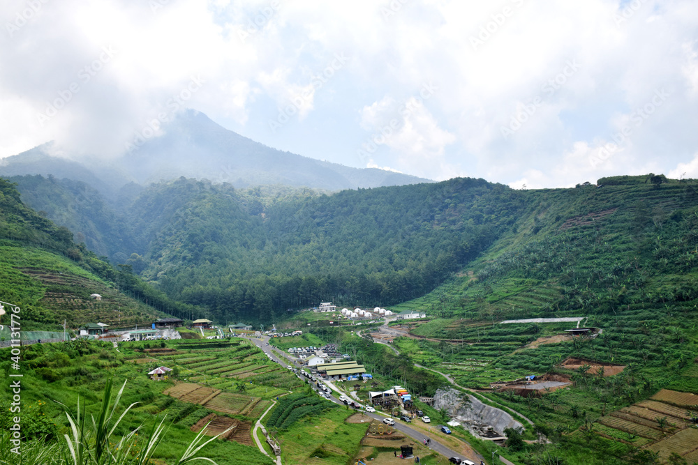 Daytime view of the valley with the Arjuno mountains in Malang, East ...