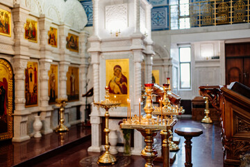 Canvas Print - a candle holder with many candles in the Church. Christian Orthodox.