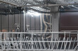 © kurgu128 - rack for dishes in the dishwasher, close-up