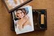 USB flash drive and a printed copy of the wedding photos in a wooden box. 
