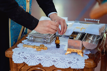 priest prepares for Chrismation is Sacrament. Christian 