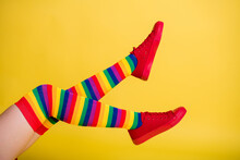 Cropped Profile Photo Of Lady Playful Raise Legs Feet Wear Striped Knee Socks Red Shoes Isolated Yellow Color Background